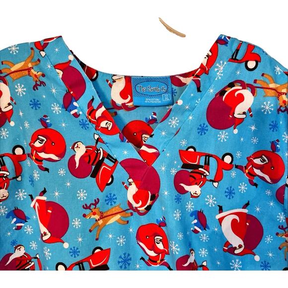 The Scrub Co XL Women’s Santa Scrub Top Blue With Adorable Santas - Picture 2 of 5